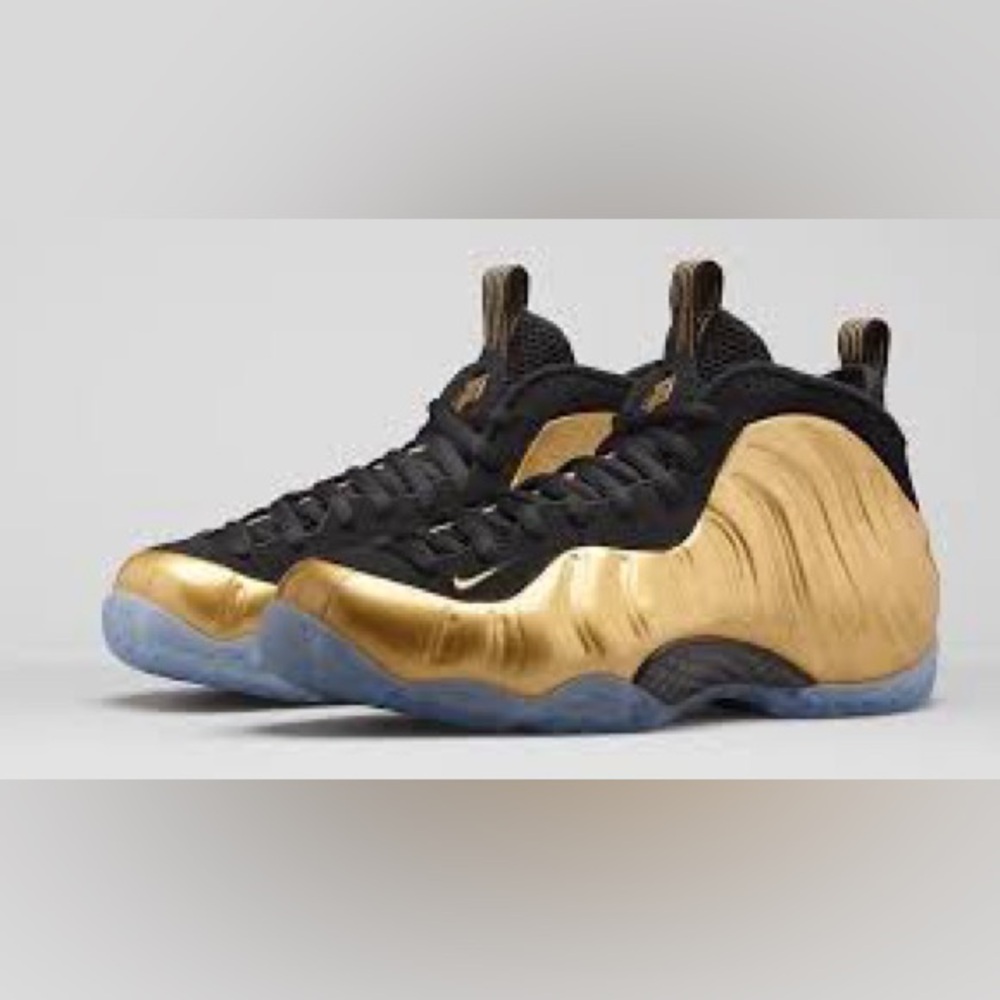 Foamposite Nike. Size 11. Color: Gold and Black